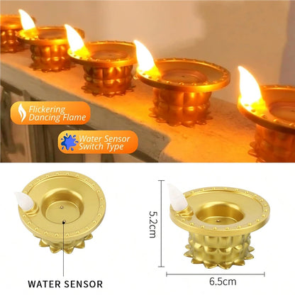 Set of 3 Wukusy water sensor LED golden diyas for home decor, featuring illuminated traditional diya designs on a decorative display.