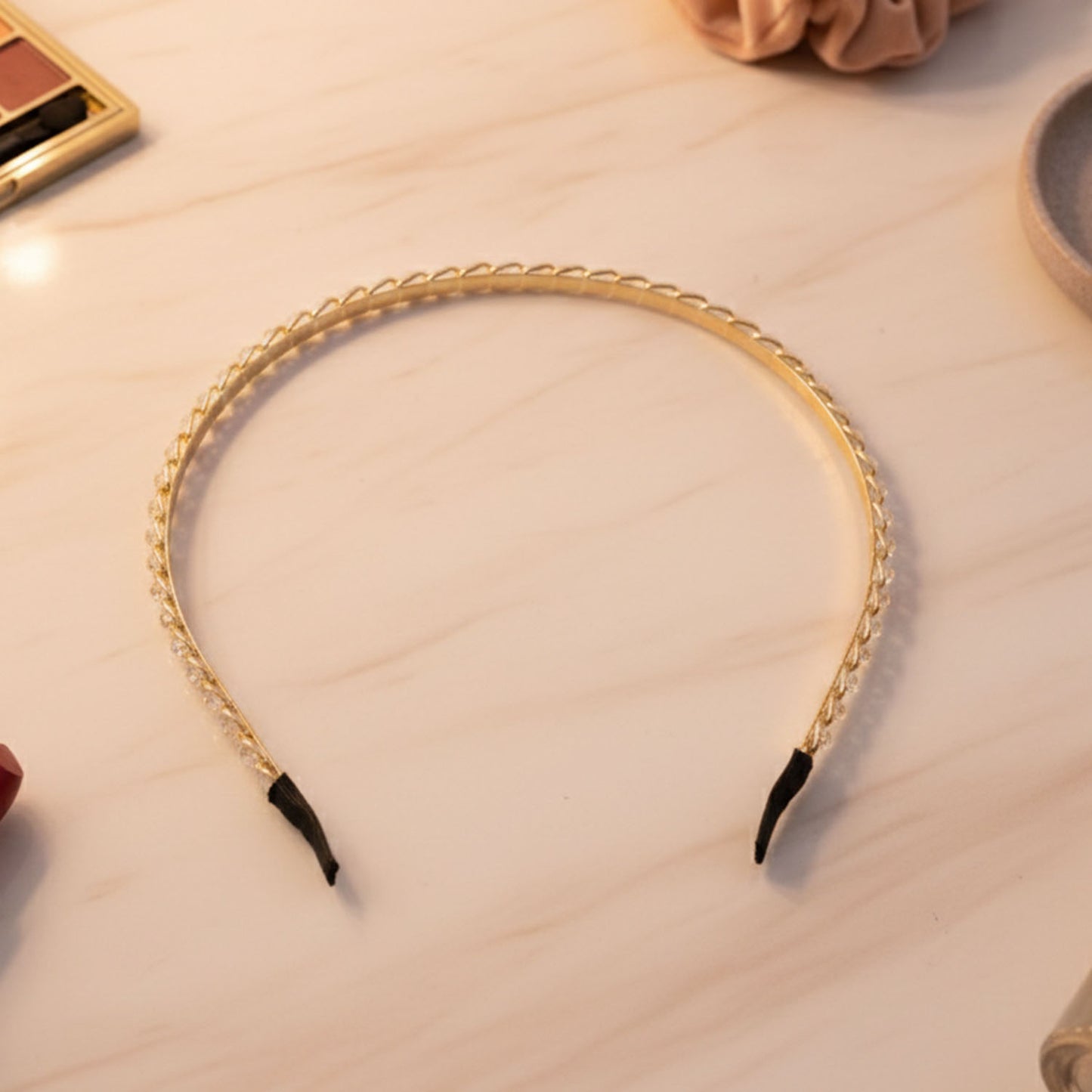 Elegant crystal-studded metal hair band by Wukusy, featuring sparkling crystals and a sleek design for stylish hair accessories.