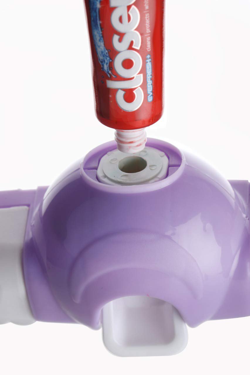 Wukusy 2139 automatic push toothpaste squeezer dispenser mounted on bathroom wall, ready to dispense toothpaste efficiently