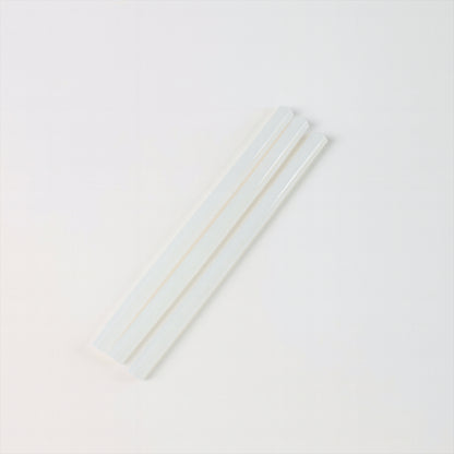 Wukusy hot melt glue sticks for glue gun, 20 cm long, ideal for home improvement projects, shown in a close-up image.