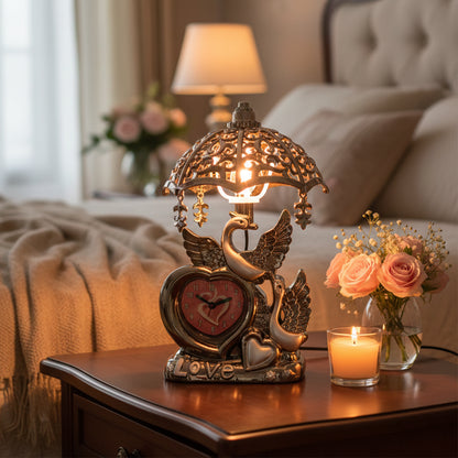 Wukusy decorative swan couple table lamp with white finish, featuring elegant swan figures on a round base, perfect for home decor.