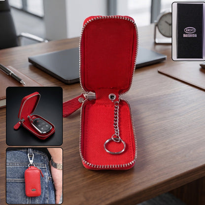 Leather car key case by Wukusy with zip closure and snap hook, designed to securely hold smart car keys.