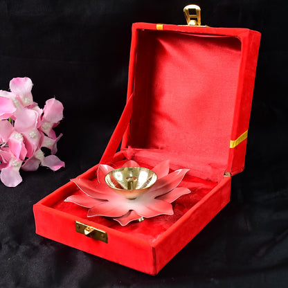 Brass lotus-shaped oil diya for home decor, featuring intricate floral design and a small bowl for oil and wick.