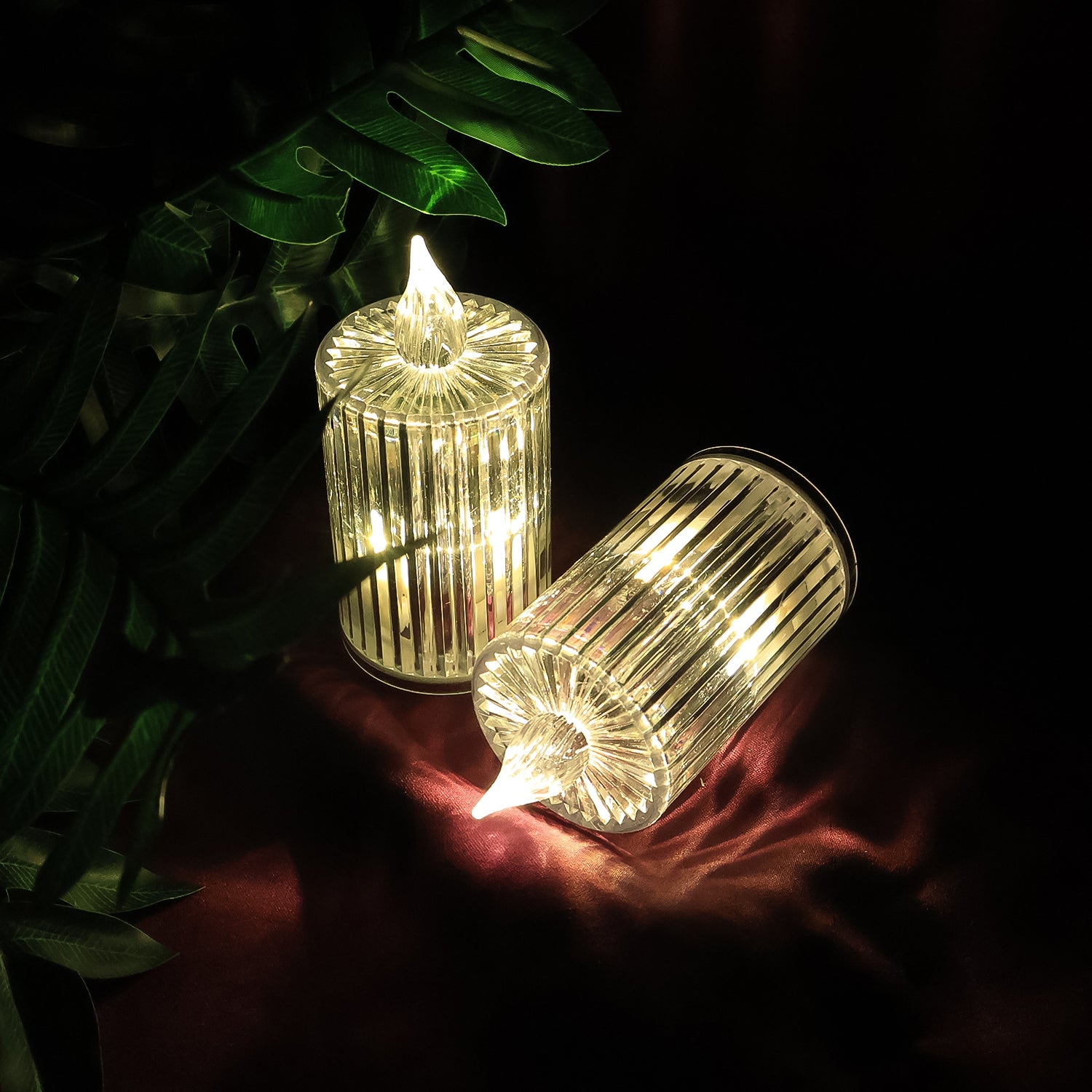 Set of five Wukusy crystal effect LED flameless candles for home decor, with glowing, realistic flame-like light.