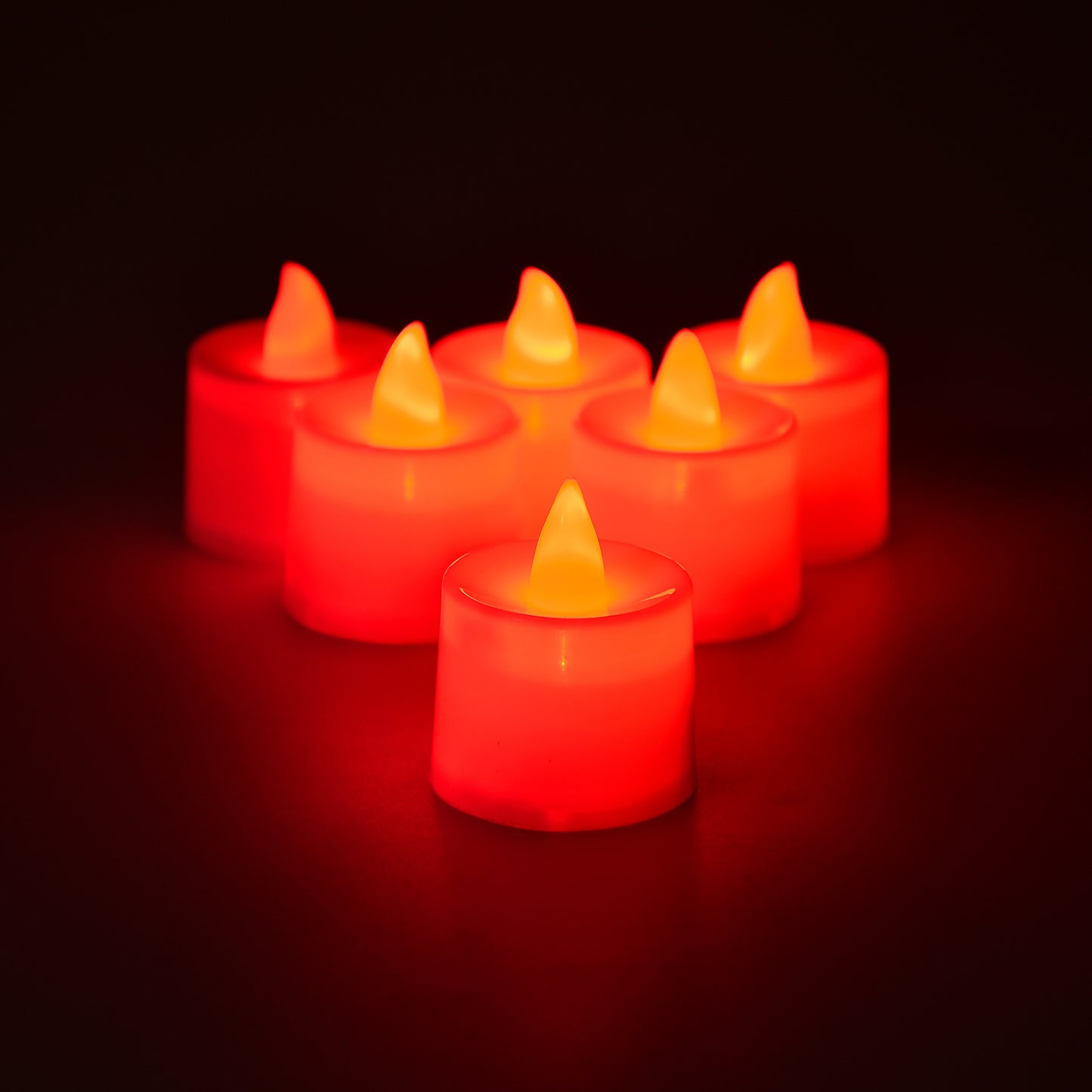 Set of 24 Wukusy red flameless LED tealights, smokeless plastic candles for home decor, safe decorative lighting.