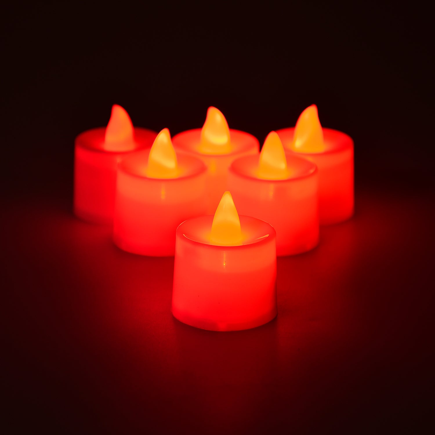 Set of 24 Wukusy red flameless LED tealights, smokeless plastic candles for home decor, safe decorative lighting.