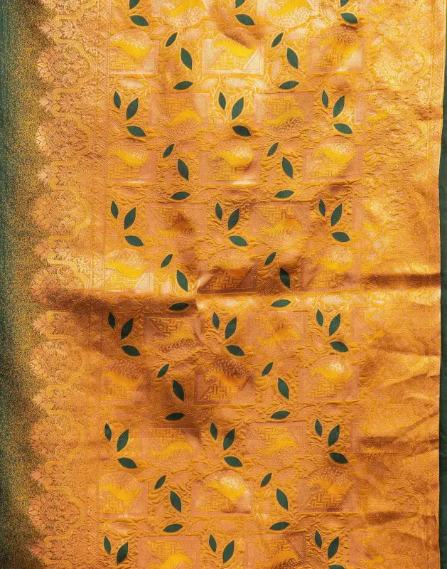 Elegant green and gold silk saree for women from Ekom's Royal Green Golden Elegance Collection, showcasing intricate traditional design.