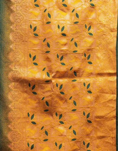 Elegant green and gold silk saree for women from Ekom's Royal Green Golden Elegance Collection, showcasing intricate traditional design.
