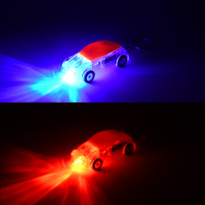 Wukusy mini car shape LED keychain light with a random color, compact and portable for key or bag attachment.