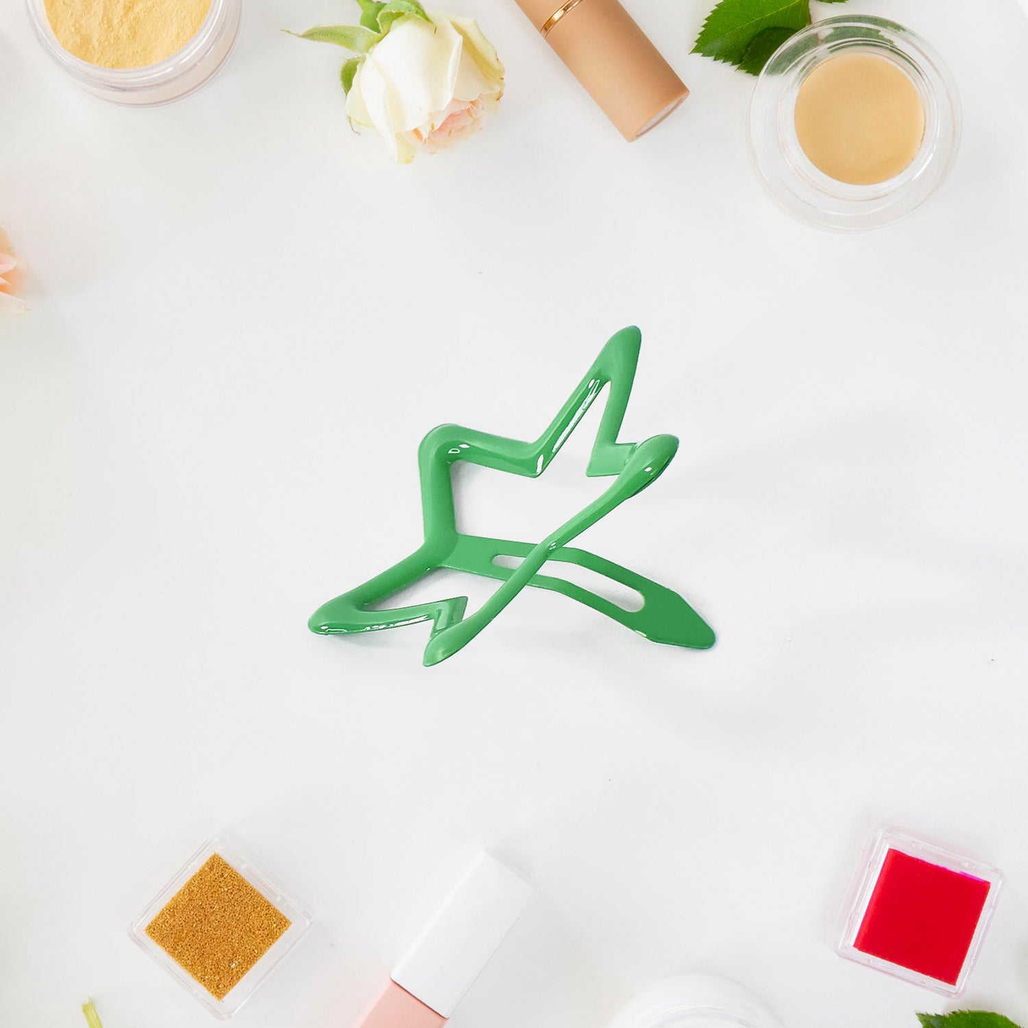 Set of 10 metal printed star-shaped hair clips by Wukusy, featuring shiny silver finish and secure grip for stylish hair accessories.