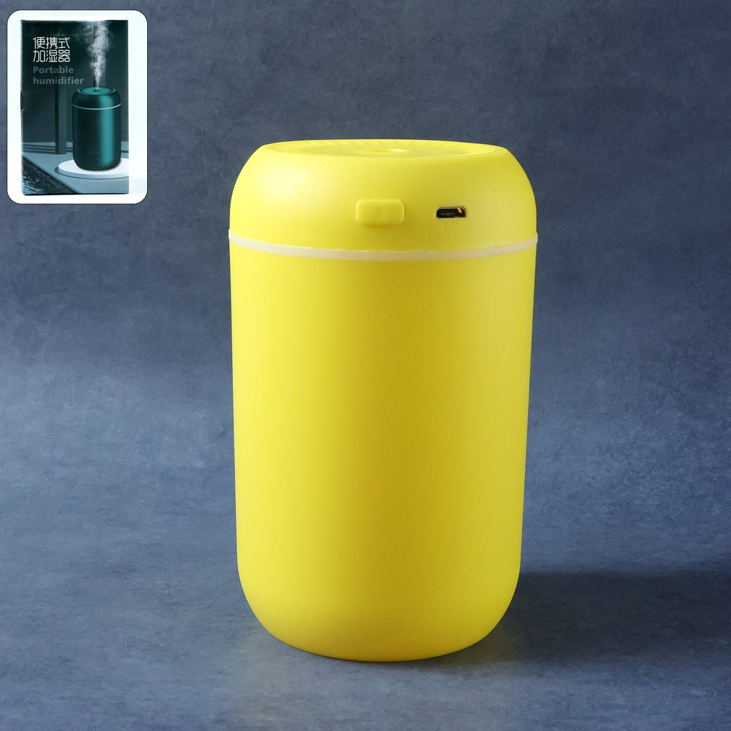 Wukusy portable USB-powered mini air humidifier emitting mist, compact device suitable for desktop or small space use