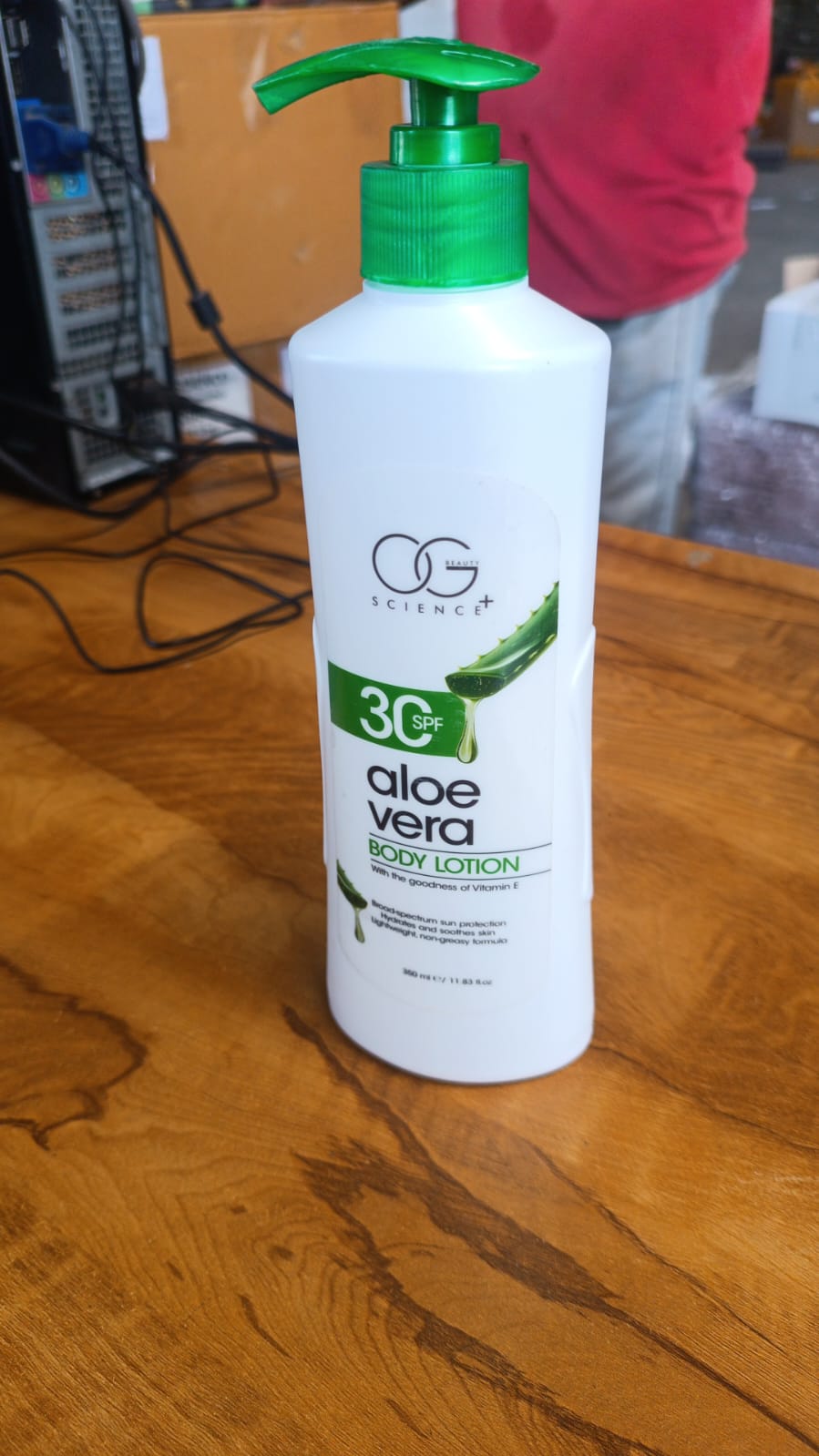 Wukusy Og Beauty Science Aloe Vera Body Lotion in 350ml bottle, featuring clear label and white pump dispenser for hydrating skincare.