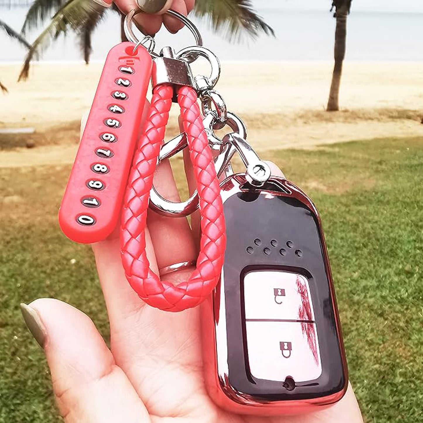 Wukusy anti-lost keychain with number plate, showing a compact key holder with attached number tag for easy identification