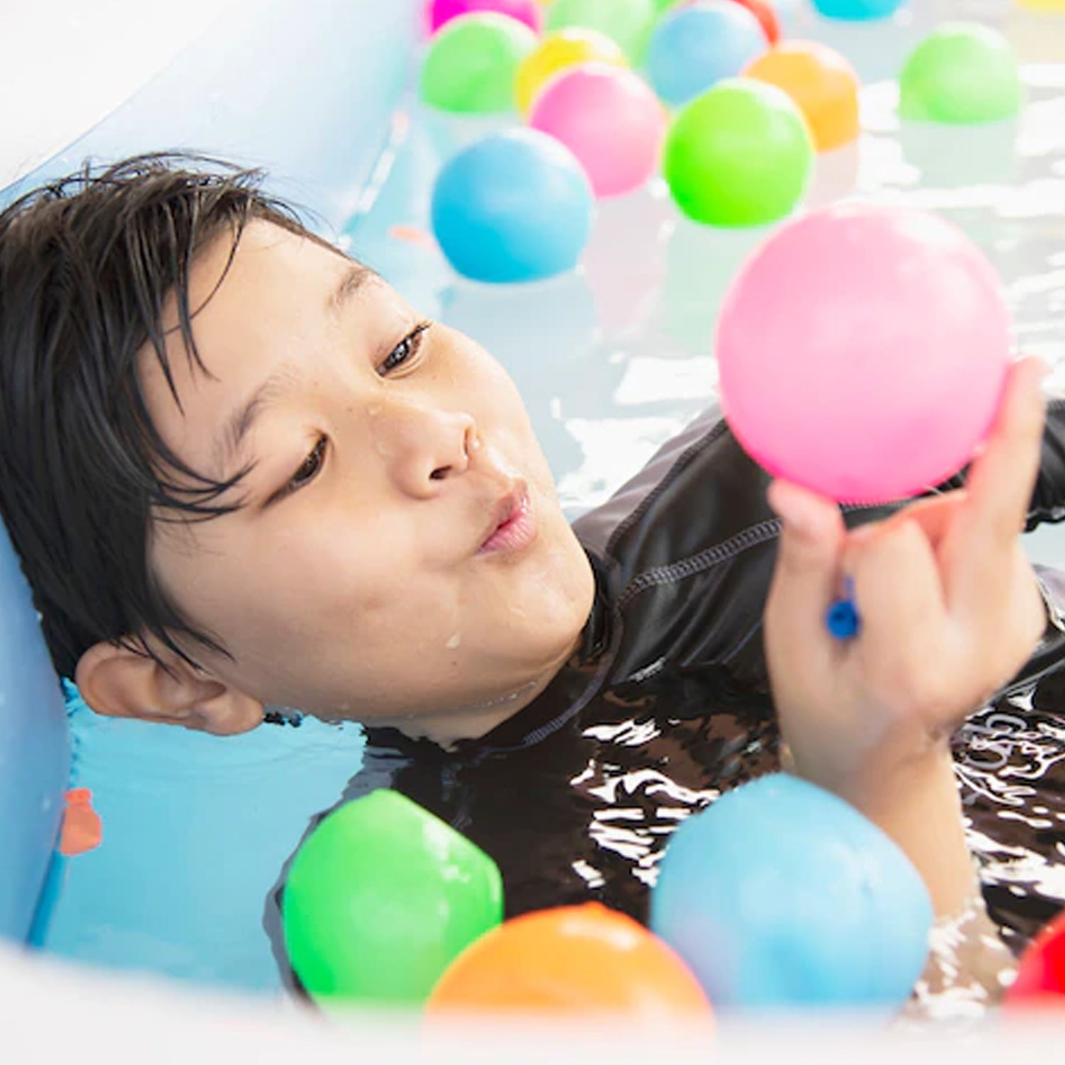 Colorful Wukusy baby premium multicolor balls for kids pool and indoor play, soft, safe for toddlers in tents and tunnels.