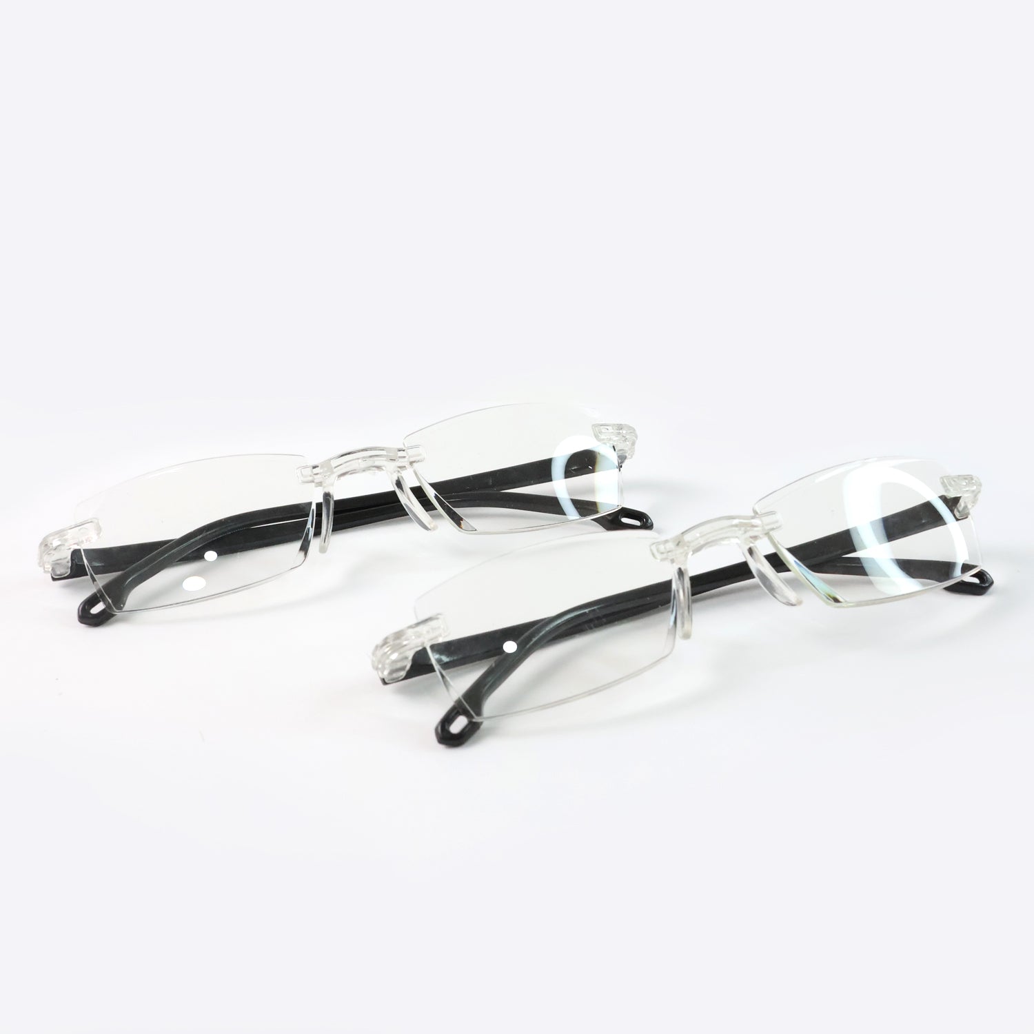 Pack of 2 Wukusy rimless reading glasses showcasing lightweight, comfortable design with clear lenses.