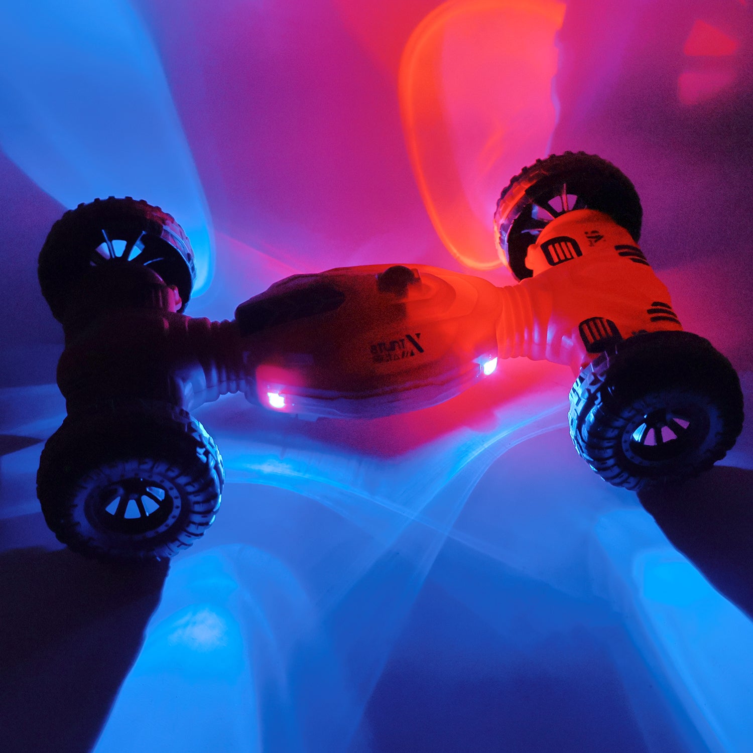Wukusy remote control stunt car with one-key deformation feature, shown in action on a smooth surface.