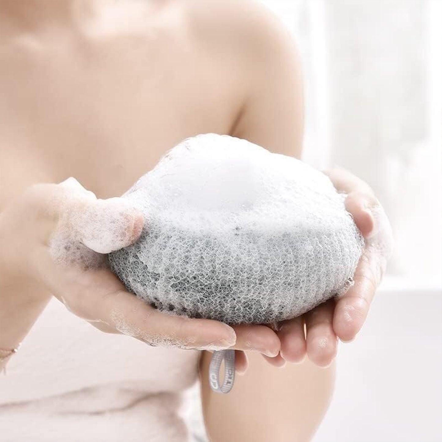 Wukusy soft bath sponge with flower design and suction cup for shower, exfoliating foam loofah for women and men.