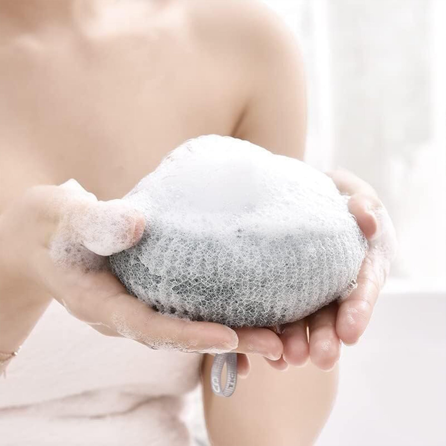 Wukusy soft bath sponge with flower design and suction cup for shower, exfoliating foam loofah for women and men.
