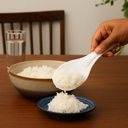 Wukusy plastic non-stick rice serving paddle with ergonomic handle, ideal for serving rice without sticking or breaking.
