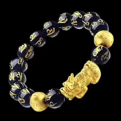Black and golden Lucky bracelet with Pixiu charm, Ekom health and household accessory, featuring intricate design and symbolic details.