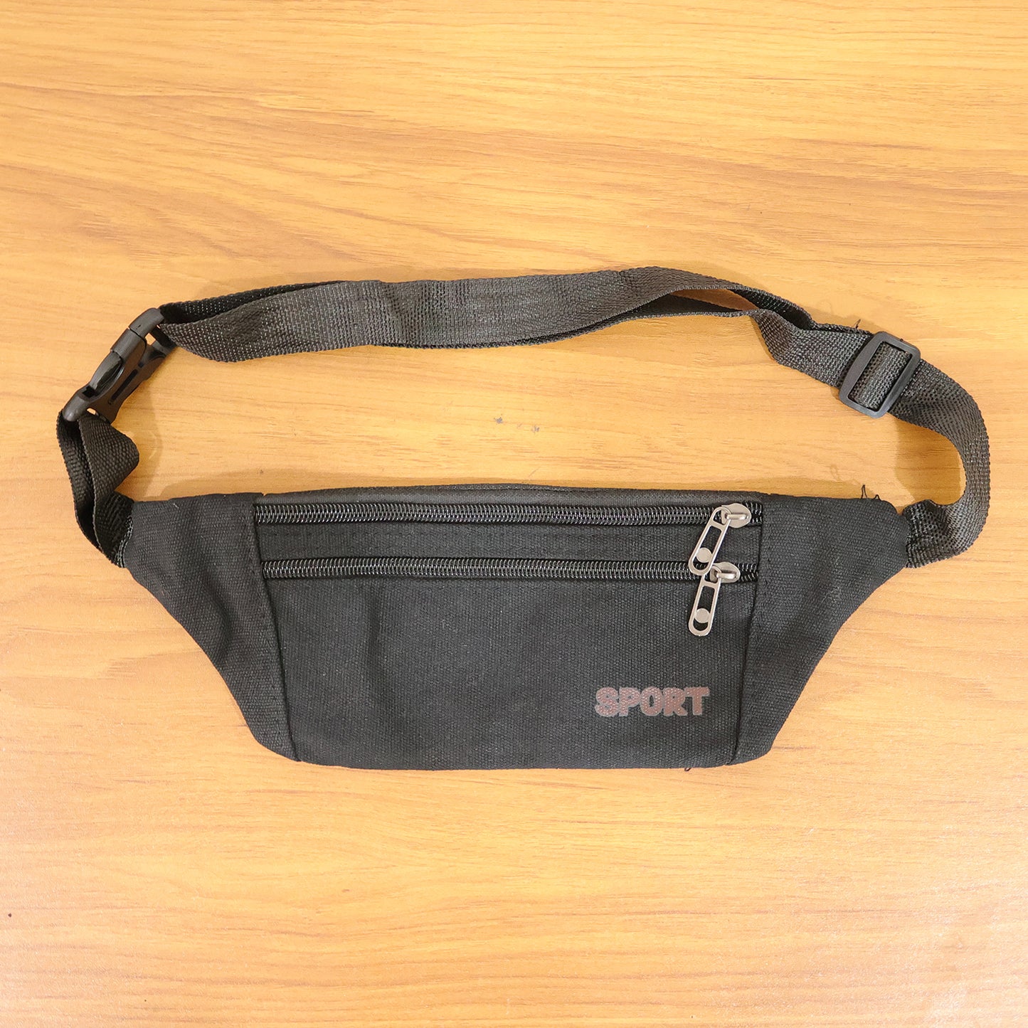 Black sports waist bag by Wukusy with adjustable strap and zippered pocket for running or casual outings.