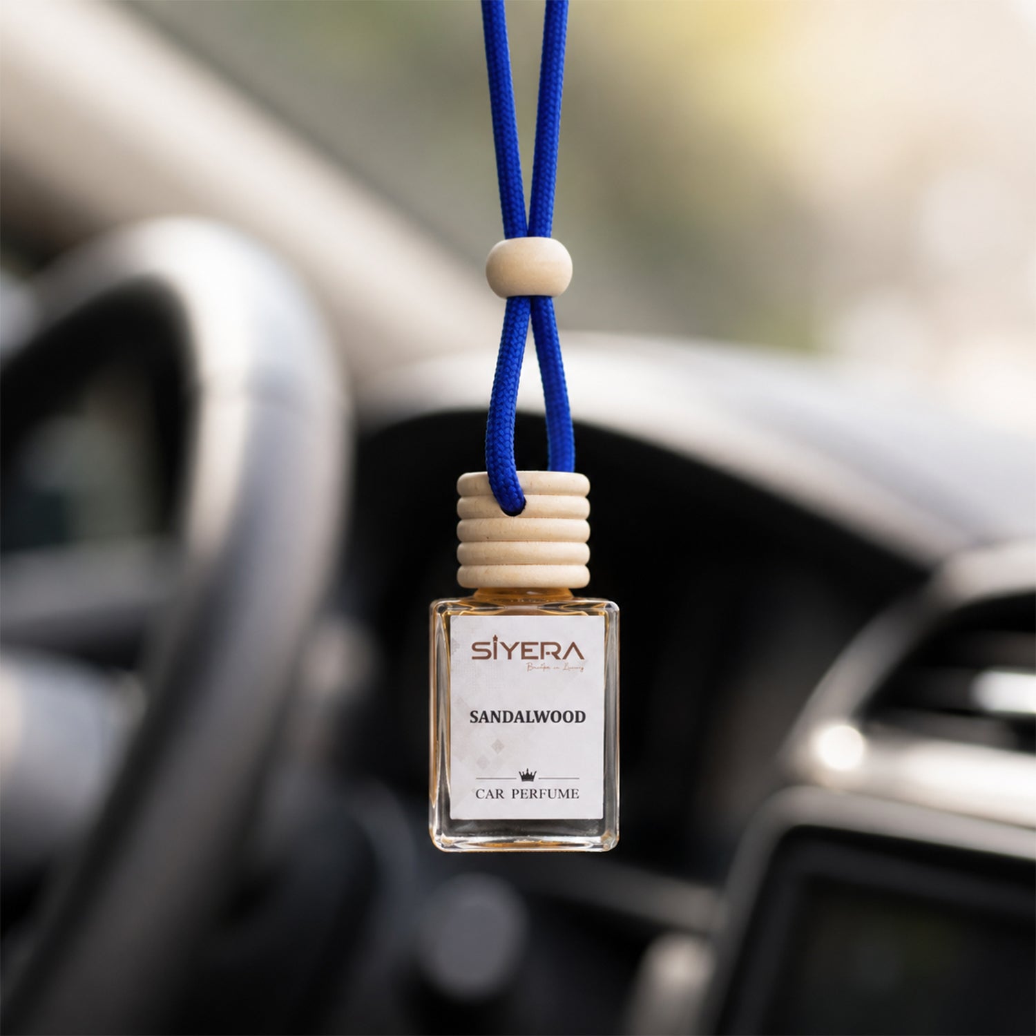 Wukusy sandalwood car perfume hanging air freshener with wooden cap, showcasing the aromatic wooden and fabric hanging design.