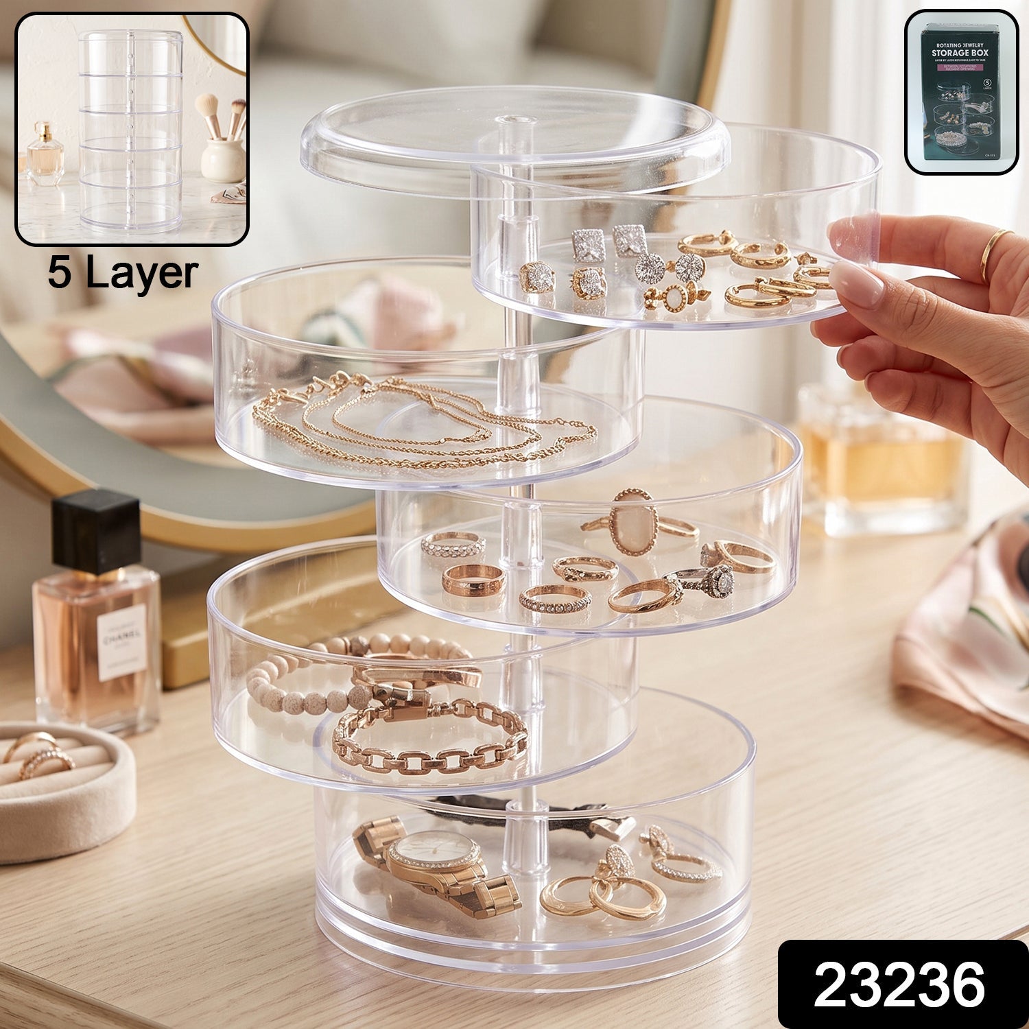 Wukusy 5-layer rotating jewelry storage box organizer with compartments for rings, earrings, and watches, shown open with jewelry inside.