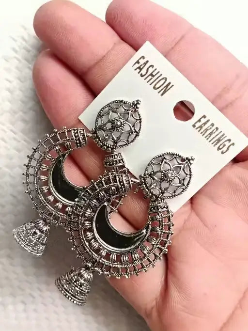 Set of 4 oxidized silver jhumki and hoop earrings for women and girls, featuring traditional and contemporary jewelry styles.